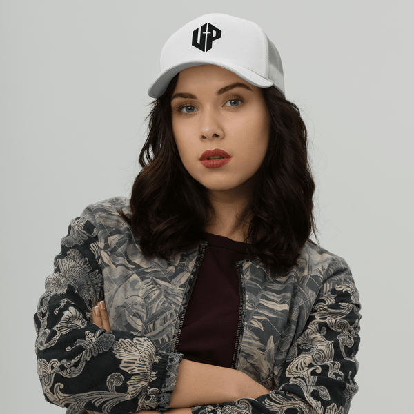 Unshaken Performance Cross Logo Trucker Cap worn by a model, showcasing faith and style in Christian apparel.