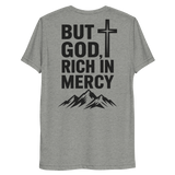 But God, Rich in Mercy Christian Men's T-Shirt in Athletic Grey Triblend, featuring bold text and a cross design.