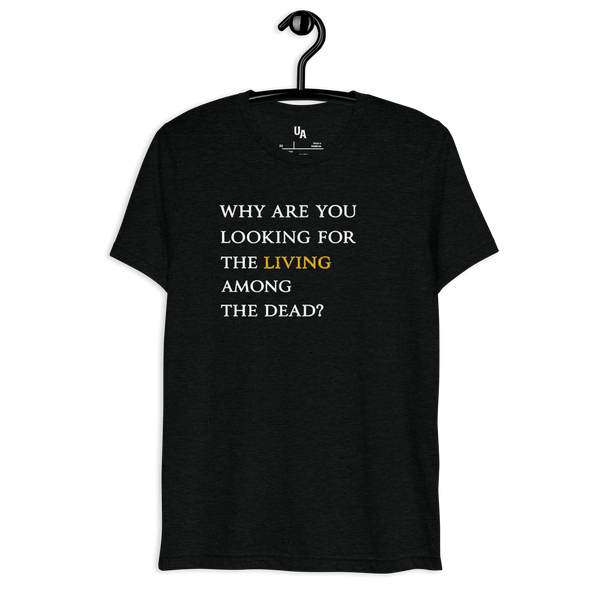 He’s Alive Resurrection T-Shirt featuring the quote 'Why are you looking for the living among the dead?' for Christian faith.