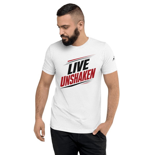 Live Unshaken Forward Motion Design T-Shirt displaying bold typography and athletic lines symbolizing faith and strength.