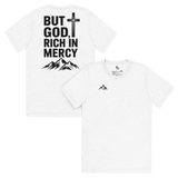 But God, Rich in Mercy Christian Men's T-Shirt featuring mountain graphics and bold text for faith apparel.