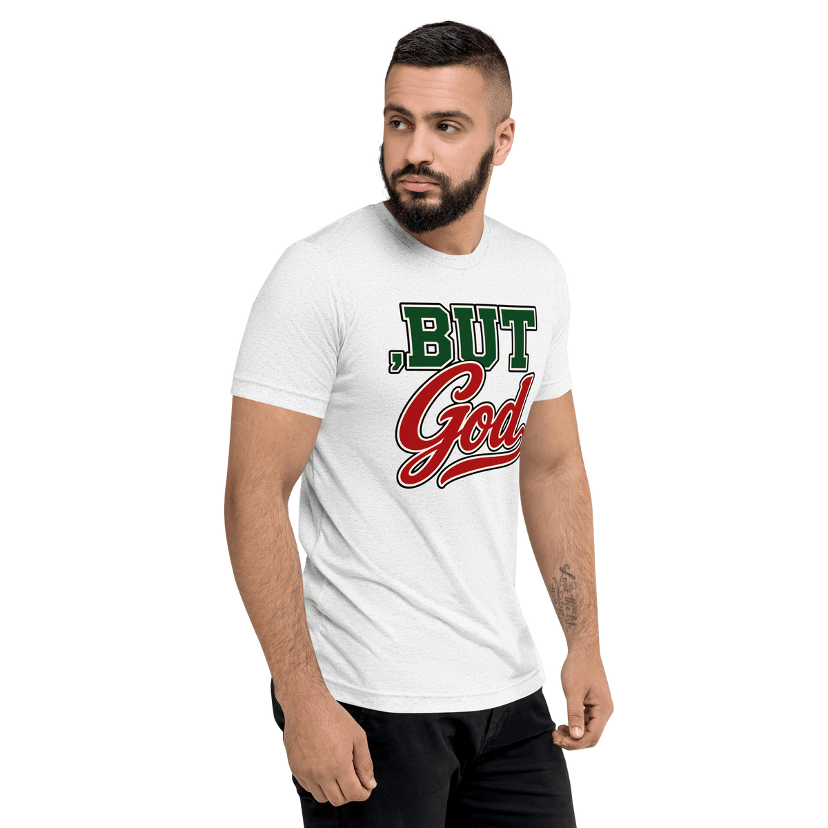 Man wearing a white t-shirt featuring the "But God" Retro Varsity Christian T-Shirt design, showcasing faith and style.