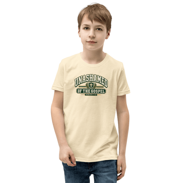 Unashamed Varsity Youth T-Shirt worn by a boy, showcasing faith and Christian message with bold lettering.