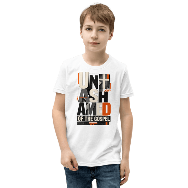 Unashamed Romans 1:16 Youth T-Shirt worn by a boy, featuring bold typography and Christian faith theme.